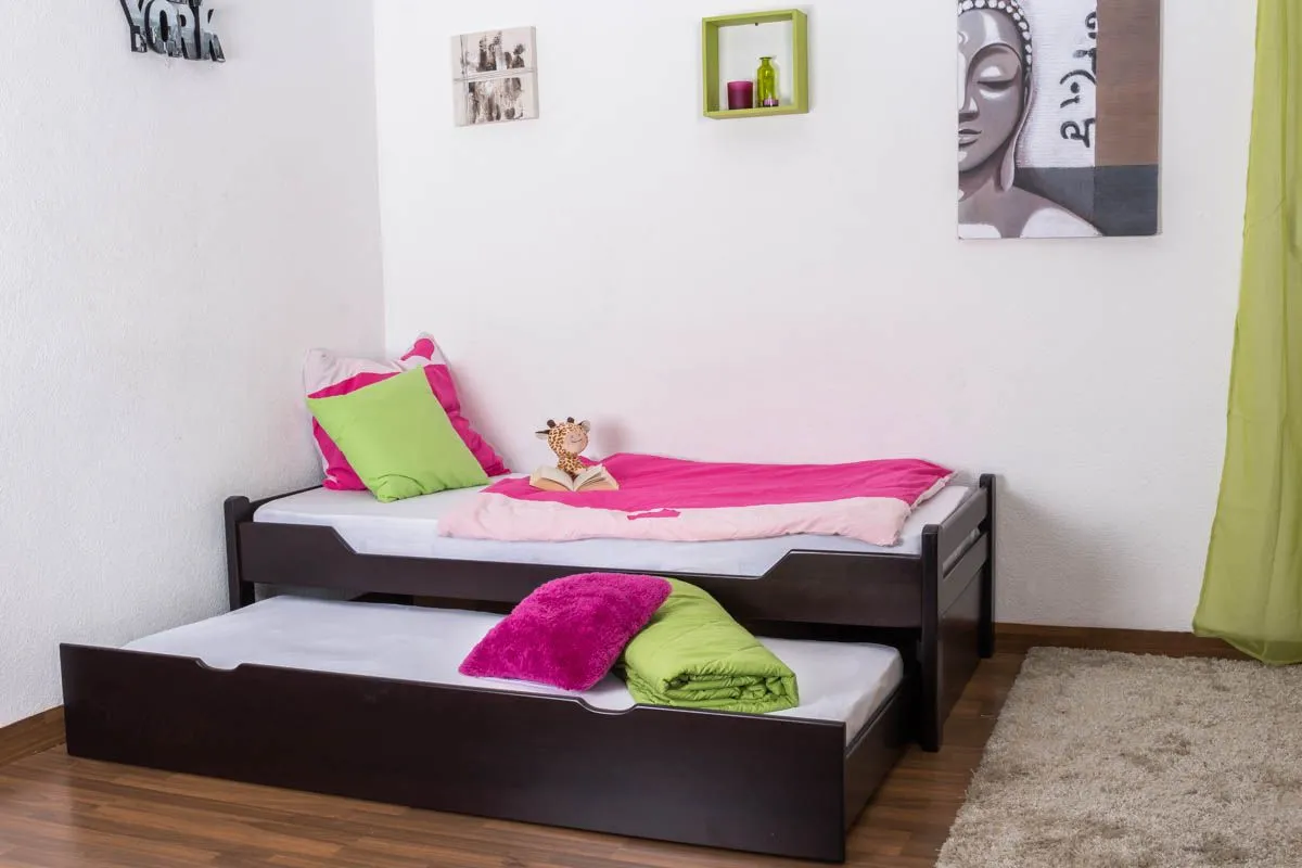 Einzelbett / Ausziehbett "Easy Premium Line" K1/1h inkl. 2. Liegeplatz und 2 Abdeckblenden, 90 x 200 cm Buche Vollholz massiv Schokobraun