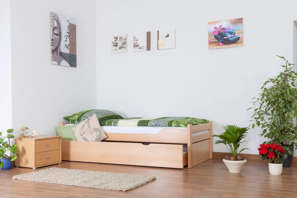 Einzelbett / Ausziehbett "Easy Premium Line" K1/1h inkl. 2. Liegeplatz und 2 Abdeckblenden, 90 x 200 cm Buche Vollholz massiv Natur